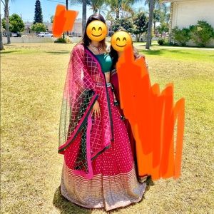 Pink, green and gold lengha.